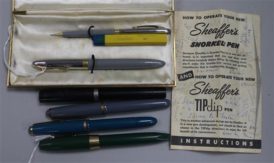 A Sheaffers Snorkel White Dot pen and pencil set, cased, three other Sheaffer and an Onoto pen